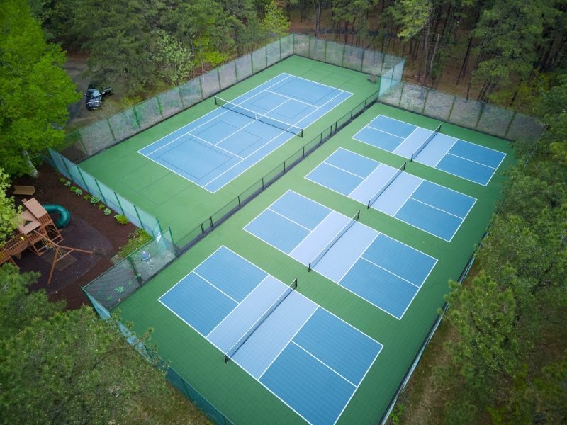Photo of multiple courts build by Sport Court of MA, in Cotuit, MA.